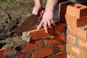 Bricklayer build house extension.